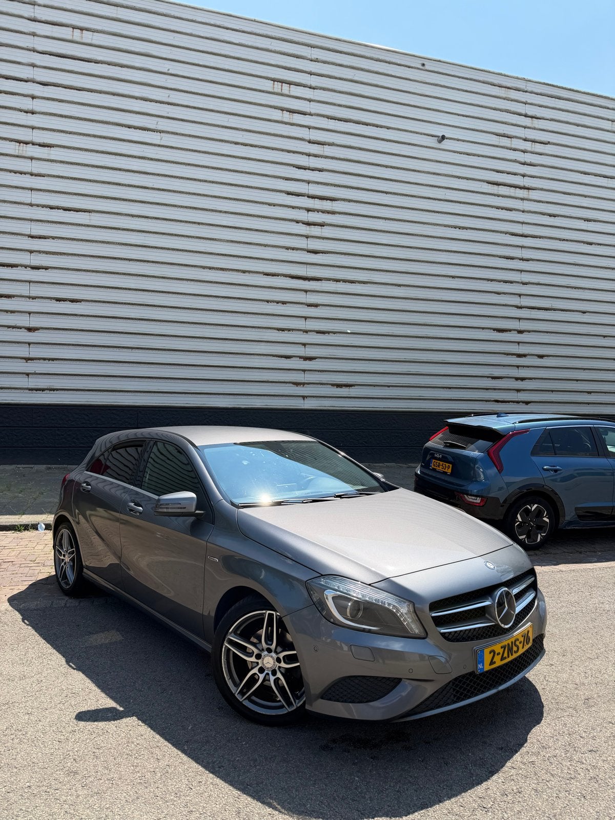 Mercedes-Benz A-Klasse A180 1.6 Blue Efficiency 2015 Grijs, Auto's, Mercedes-Benz, Voorwielaandrijving, 4 cilinders, 122 pk, Handgeschakeld