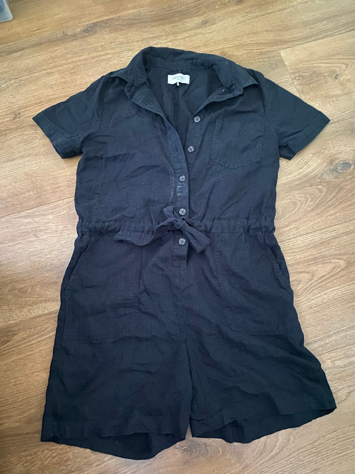 Zwarte jumpsuit met korte mouwen en strikceintuur, Ophalen of Verzenden, Zo goed als nieuw, Maat 36 (S), Zwart