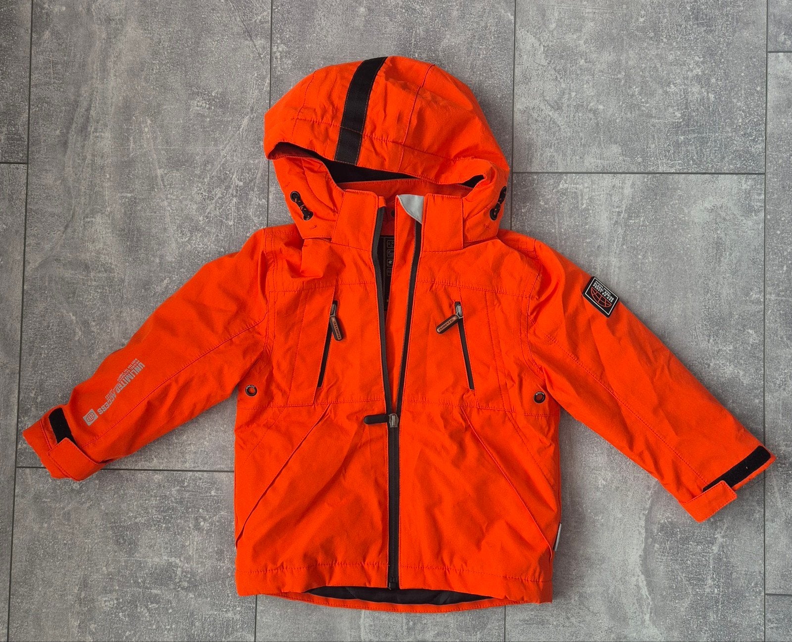 Oranje jongensjas Raintex maat 98 - Waterdicht & Winddicht, Ophalen of Verzenden, Zo goed als nieuw, Jas