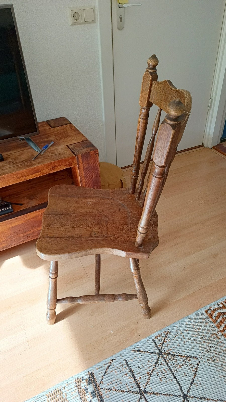 Houten eetkamerstoel, Ophalen
