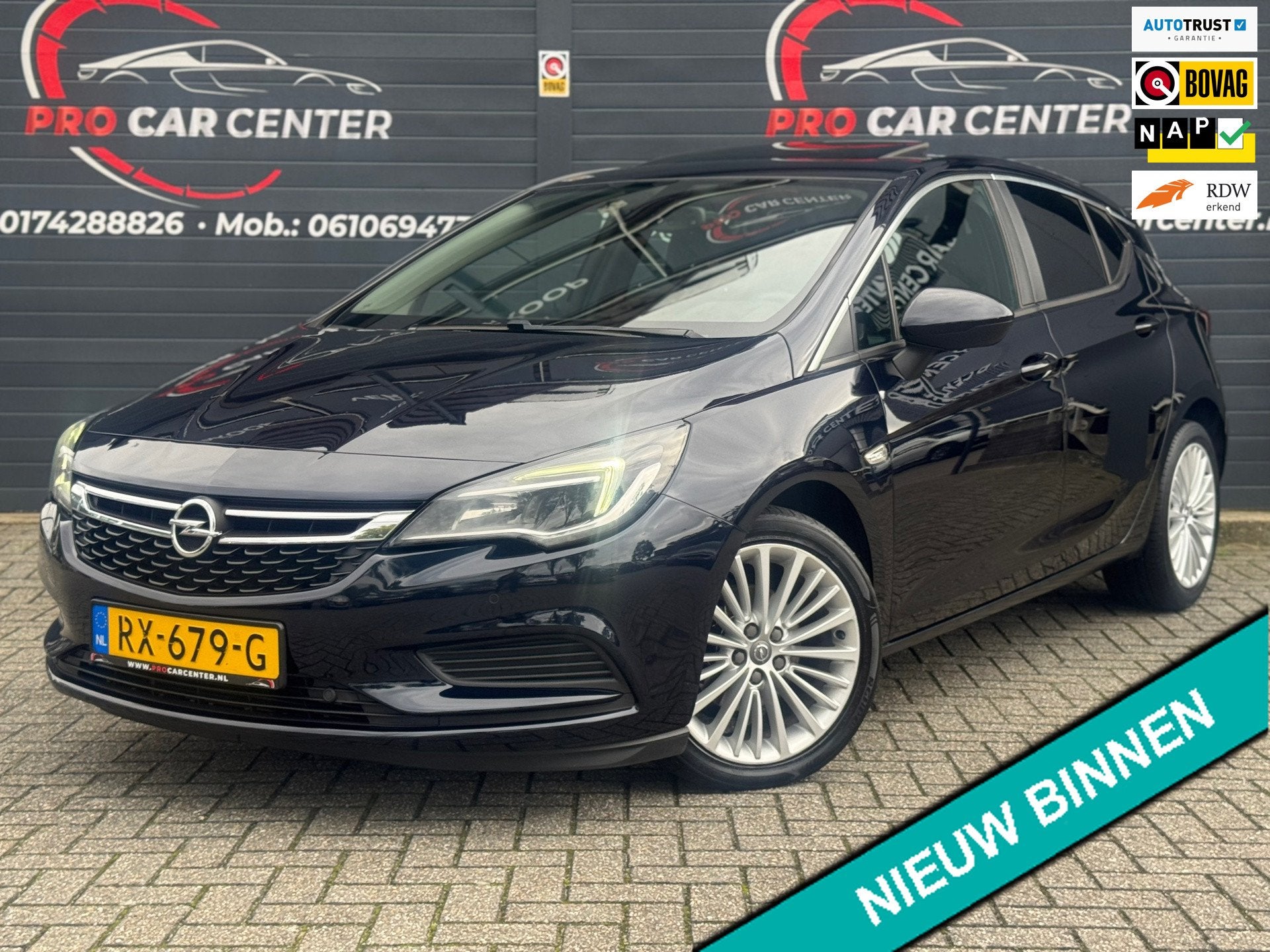 Opel Astra 1.4 Business+ Aut | Dak | Cruise | Climate | Stoe, Auto's, Gebruikt, Euro 6, 150 pk, Blauw