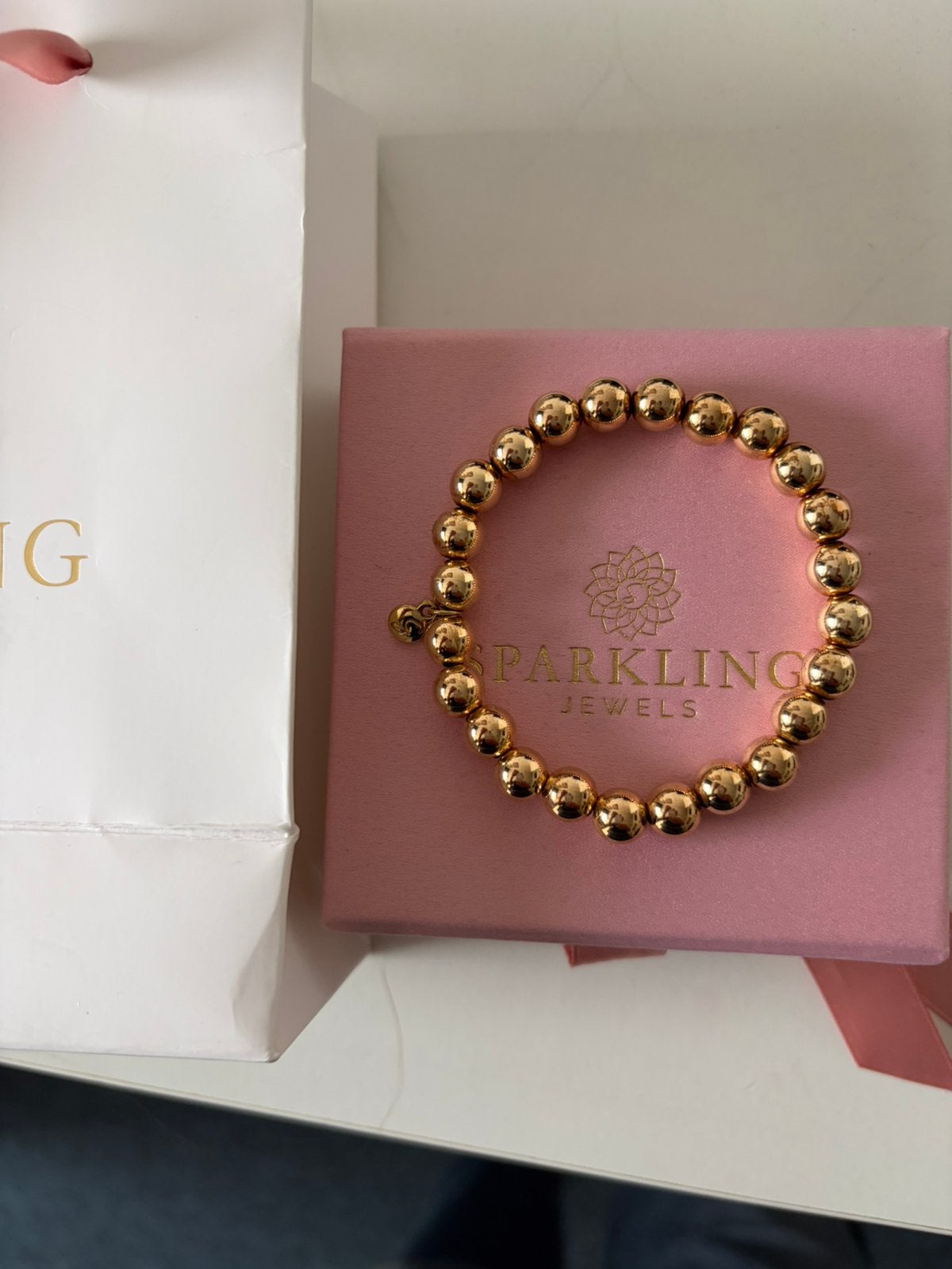 Sparkling jewels armband goud 8 mm nieuw, Ophalen of Verzenden, Nieuw, Goud