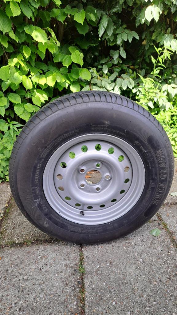 Reserveband met velg voor aanhanger, Ophalen
