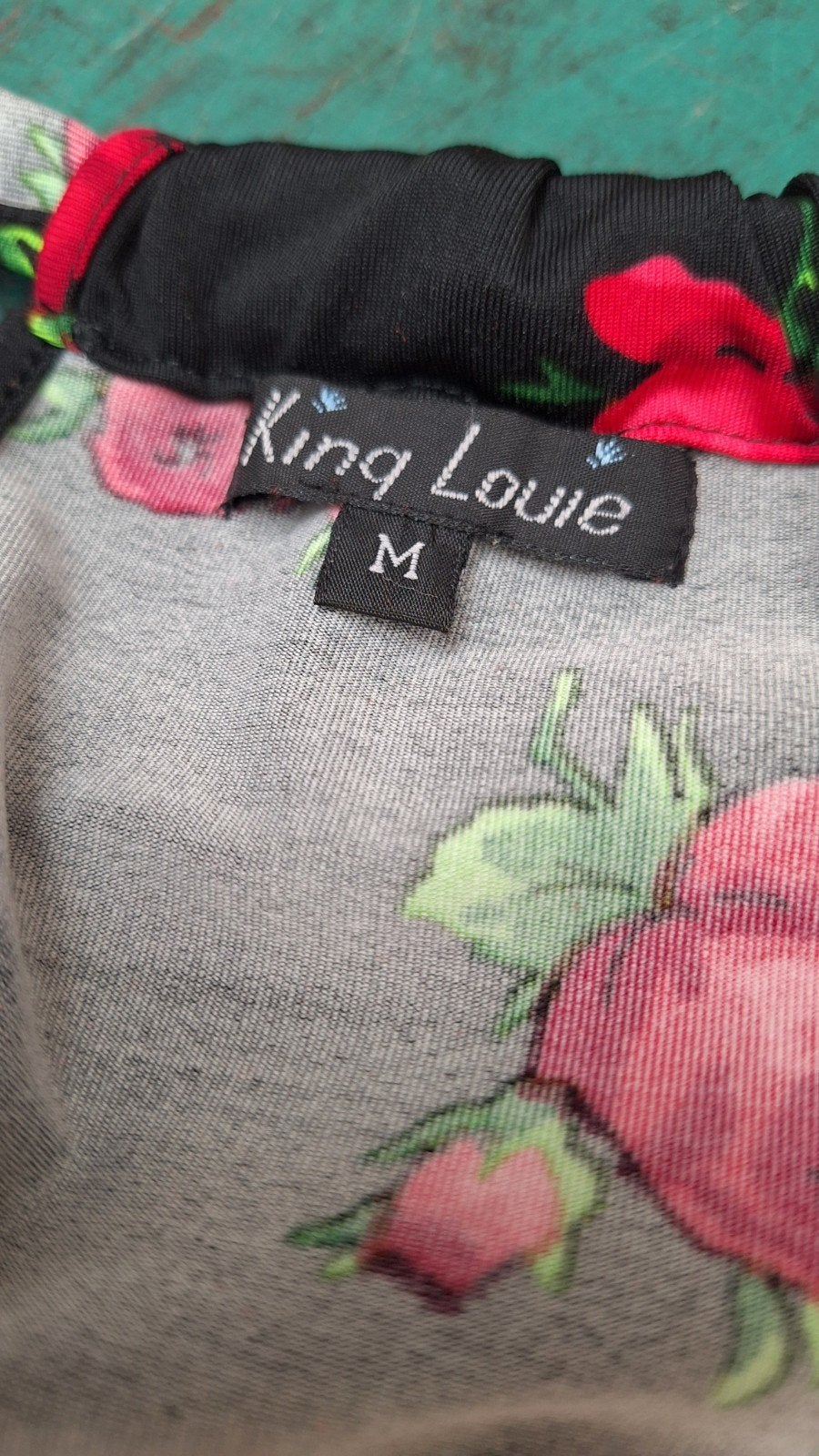 King Louie jurk met rozenprint, maat M, Kleding | Dames, Ophalen of Verzenden, Zo goed als nieuw, Zwart, Knielengte