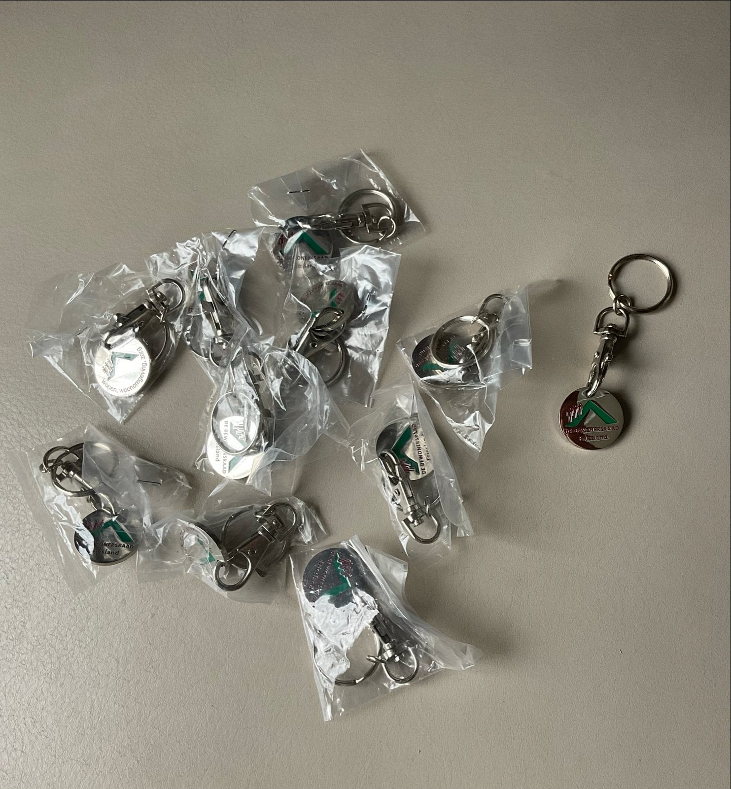 10 Winkelwagenmuntjes met sleutelhanger Nieuw in verpakking, Verzamelen, Winkelwagenmuntjes, Ophalen of Verzenden