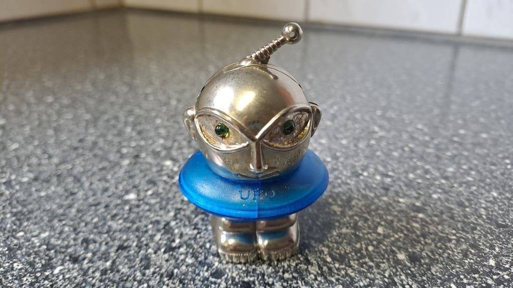 Vintage UFO Aansteker - Zilverkleurig met Groene Ogen, Verzamelen, Onbekend, Ophalen of Verzenden, Onbekend, Onbekend