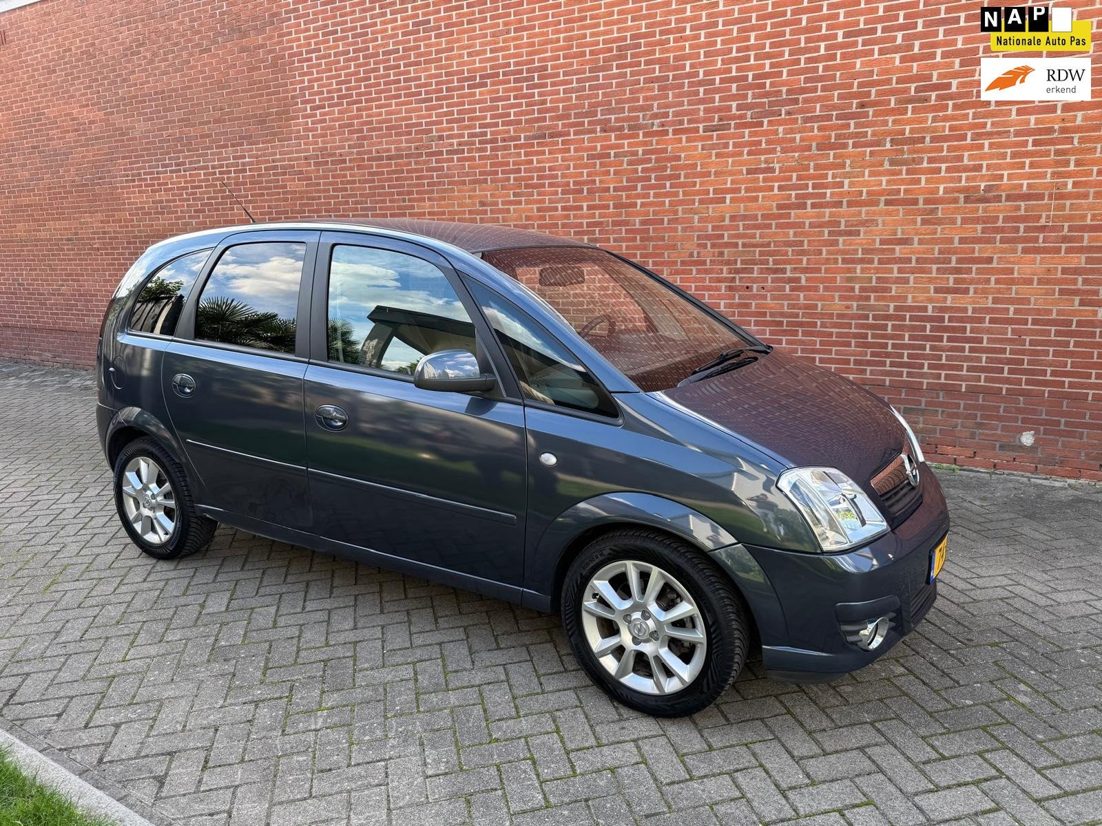 Opel Meriva 1.6-16V Cosmo Clima Cruise, Auto's, Voorwielaandrijving, 15 km/l, Zwart, 4 cilinders