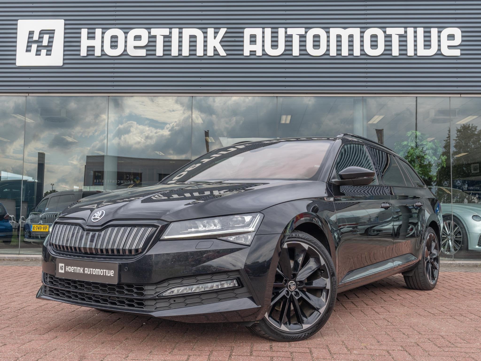 Skoda Superb Combi 1.4 TSI iV Sportline Business | BTW | Elc, Auto's, Gebruikt, 4 cilinders, Alcantara, Zwart