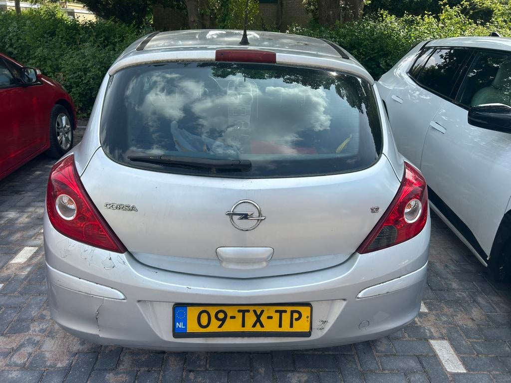 Opel Corsa 1.2 16V 3D WR 2007 Grijs, Auto's, Opel, 40 €/maand, 4 cilinders, 1229 cc, Origineel Nederlands