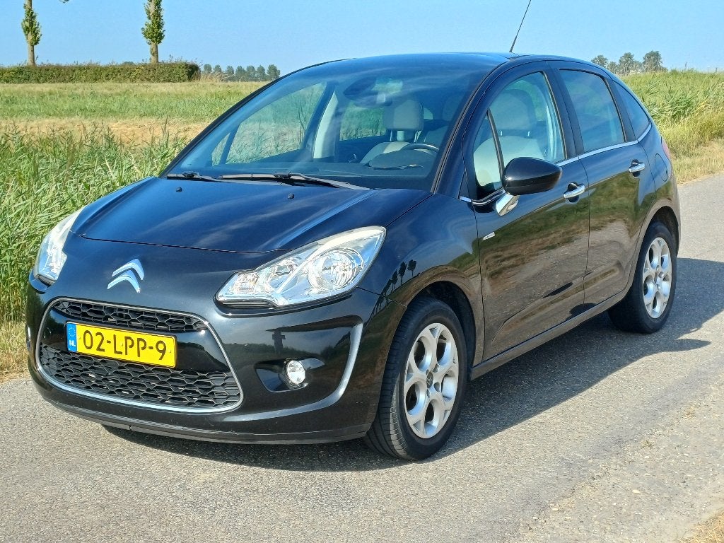 Citroën C3 1.6 VTI AUT 2010 Zwart, Auto's, Citroën, Euro 5, Zwart, 4 cilinders, Leder en Stof