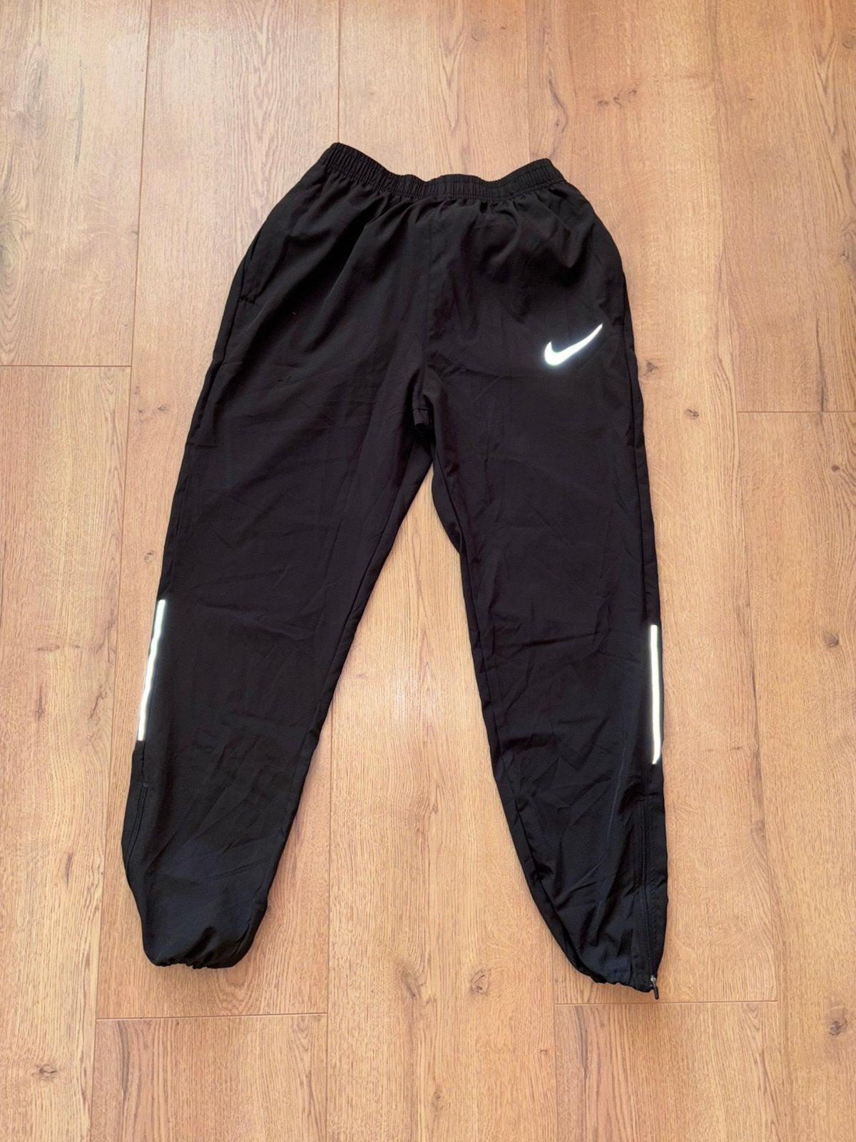Nike reflectieve broekje, Fitness, Maat 48/50 (M), Zwart, Nieuw