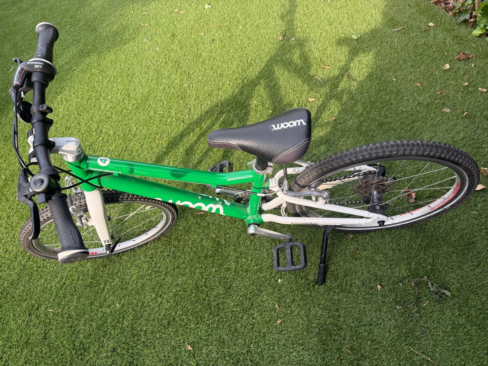 Woom 4 kinderfiets groen - Goed onderhouden, Ophalen, Gebruikt, Velgrem, 20 inch of meer