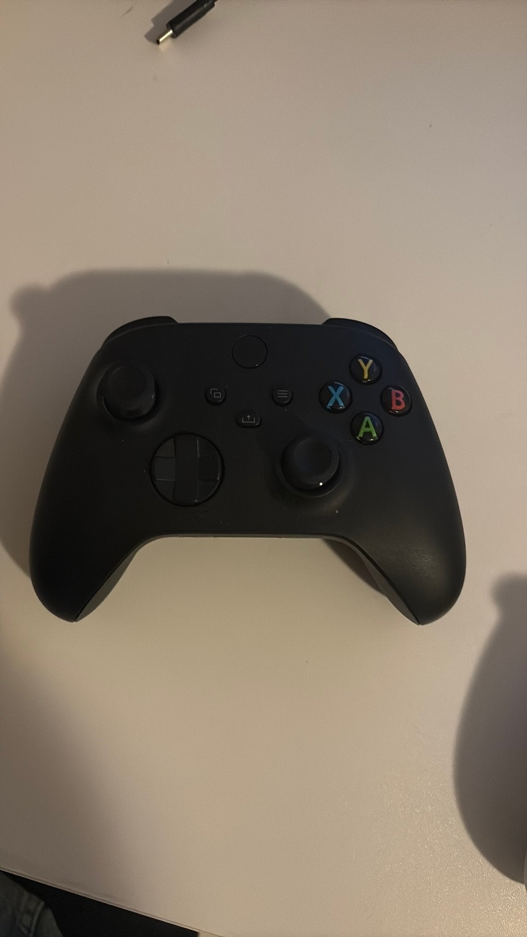 Foto 4 van Xbox series s met 2 controllers