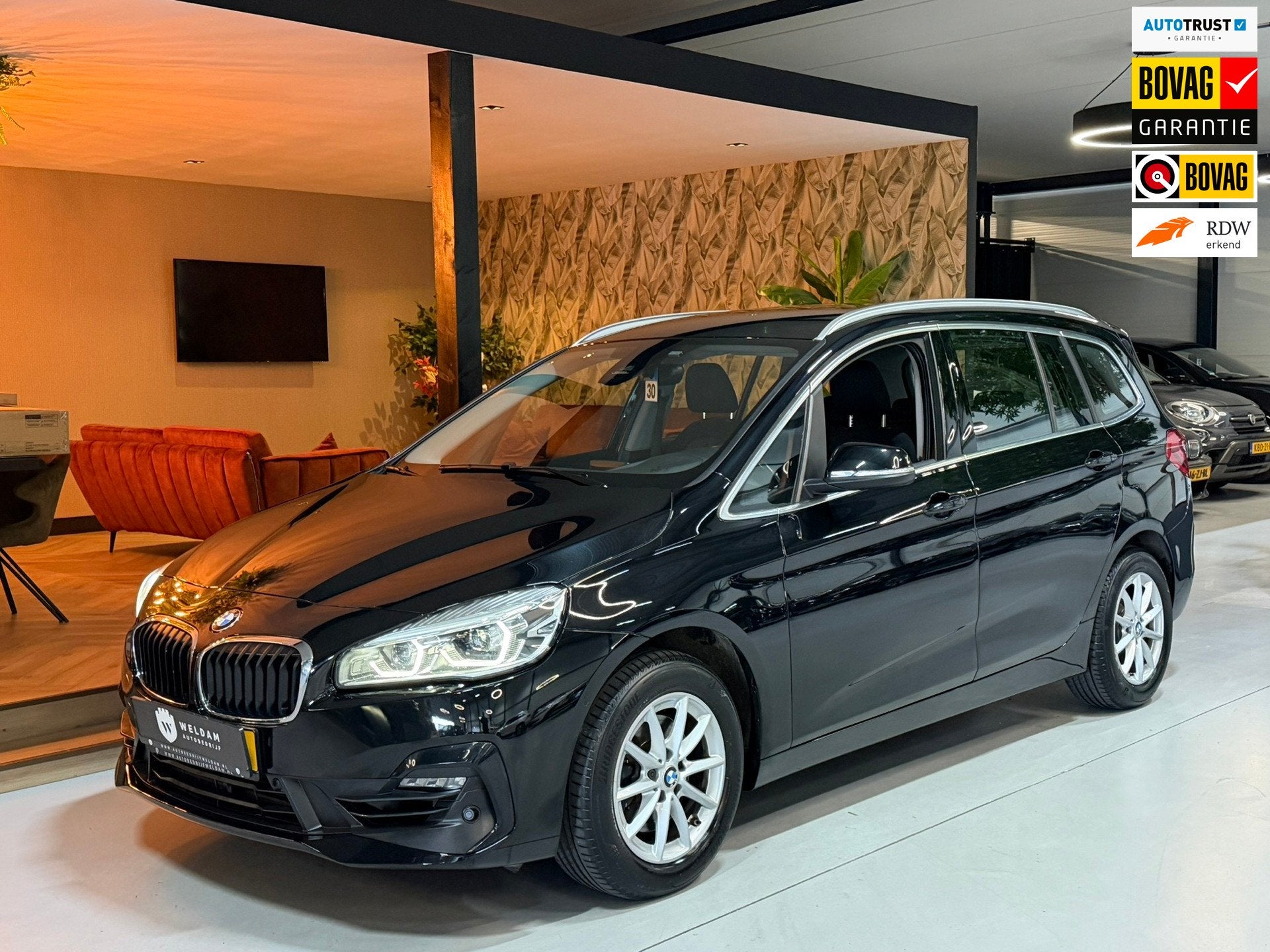 BMW 2-serie Gran Tourer 218i Luxe Uitvoering|Elektrisch Acht, Auto's, Dealer onderhouden, Stof, Zwart, Bedrijf