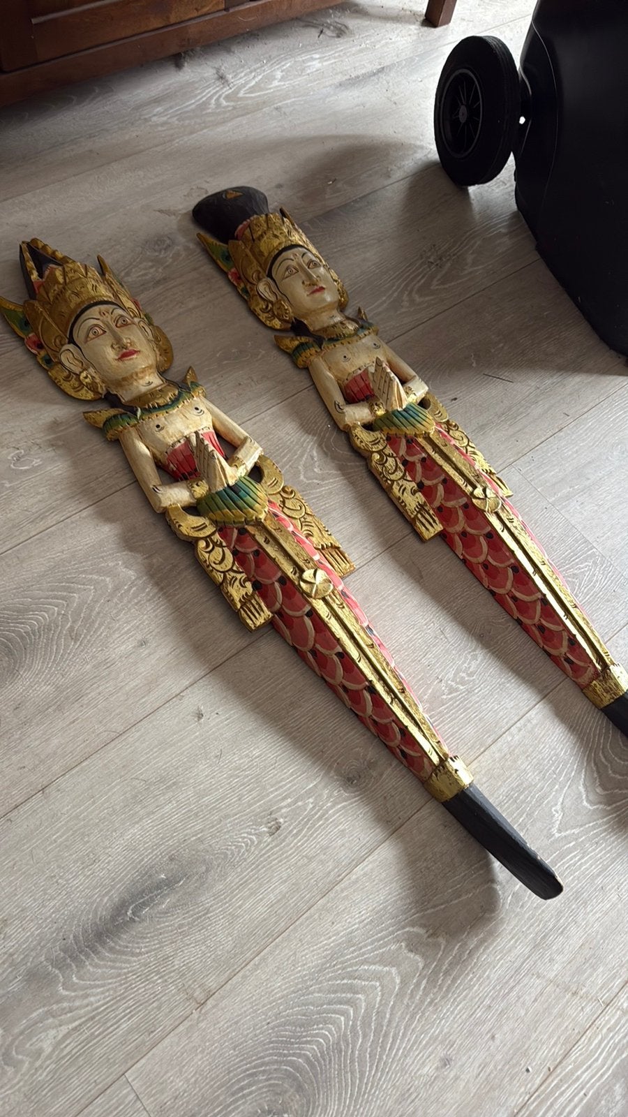 Chinees houten poppe, Ophalen