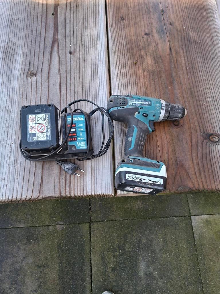 Makita accu schroefmachine DF347D met oplader, Ophalen