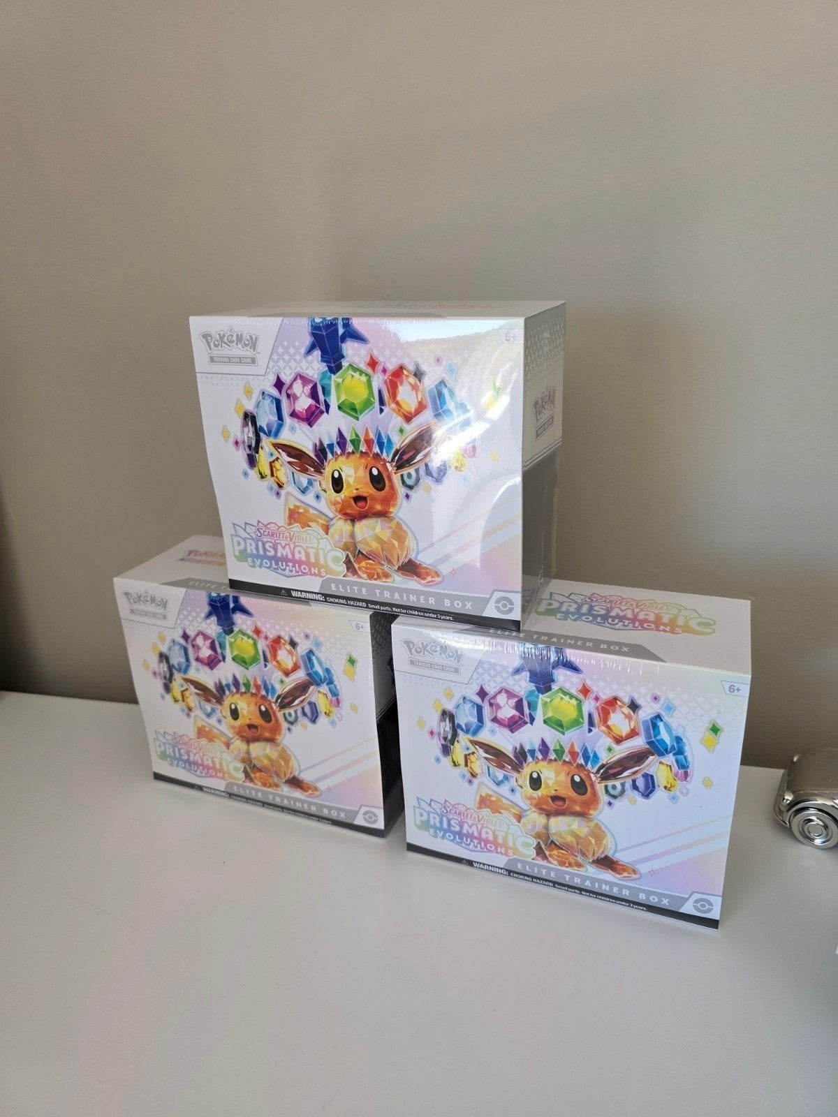 7x Pokémon Prismatic Evolutions Elite Trainer box, Ophalen of Verzenden, Nieuw, Overige typen