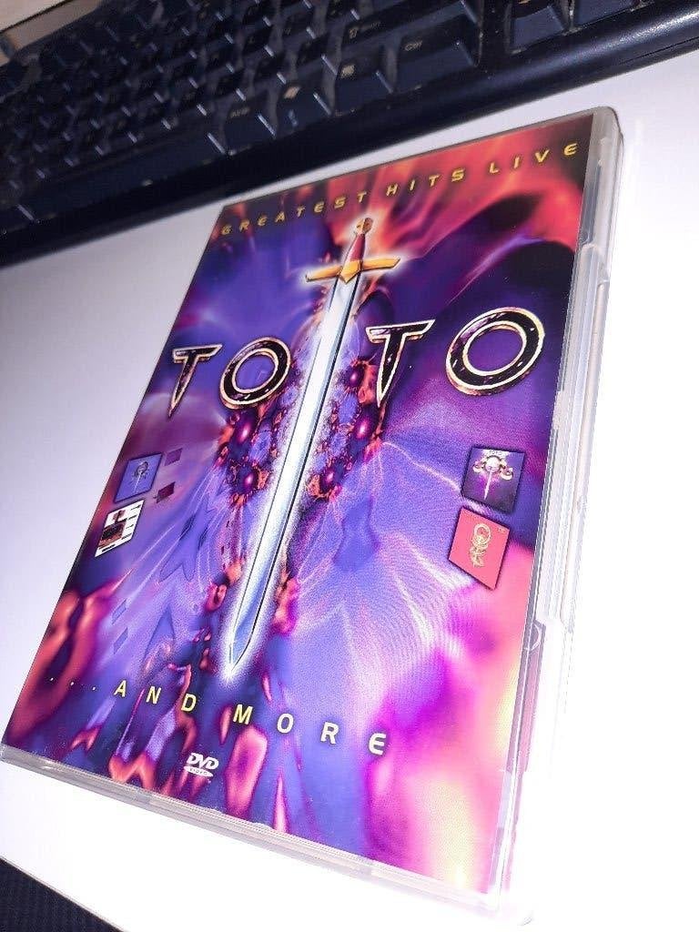 DVD Toto – Greatest Hits Live... And More, Alle leeftijden, Ophalen, Zo goed als nieuw
