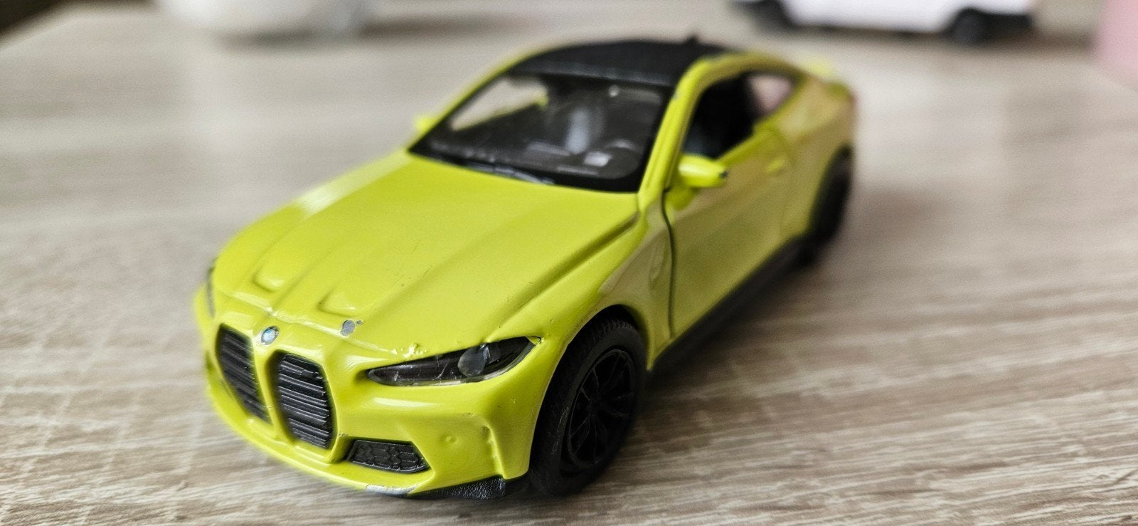 BMW M4 van Welly., Hobby en Vrije tijd, Modelauto's | 1:24, Ophalen of Verzenden, Welly