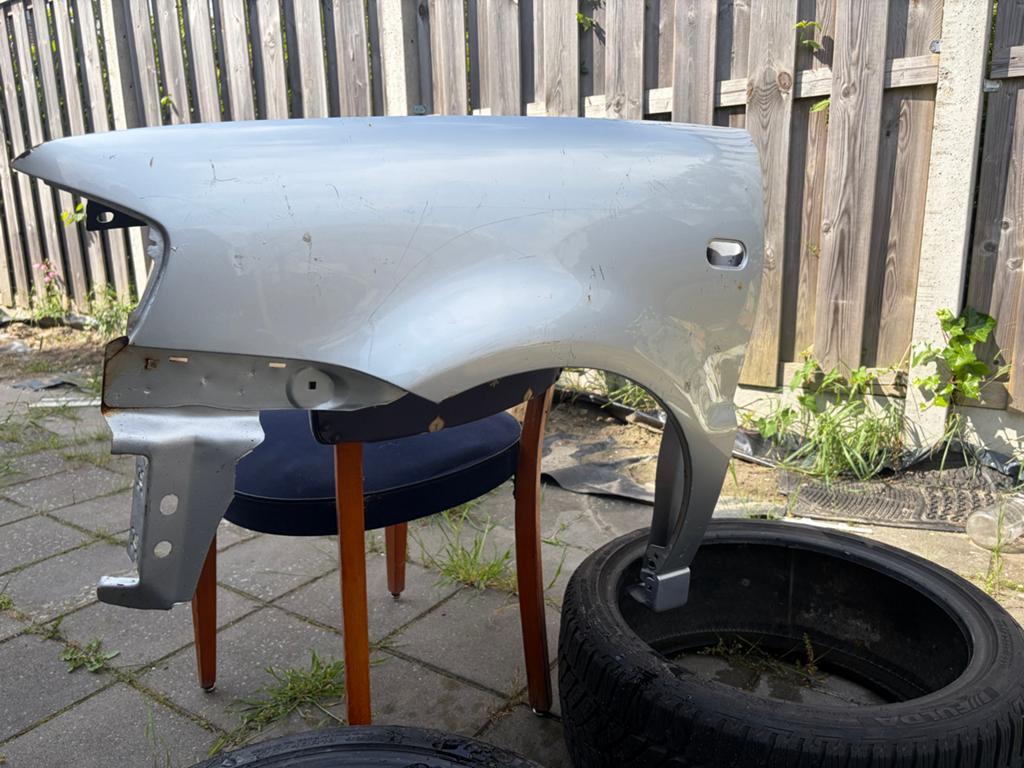 Zijscherm, Spatbord Volkswagen Golf 5 zilver - origneel, Gebruikt, Ophalen of Verzenden, Spatbord, Volkswagen