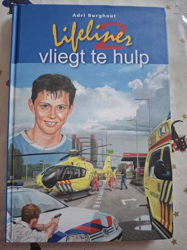Adri Burghout - Lifeliner 2 vliegt te hulp, Ophalen of Verzenden, Zo goed als nieuw, Adri Burghout