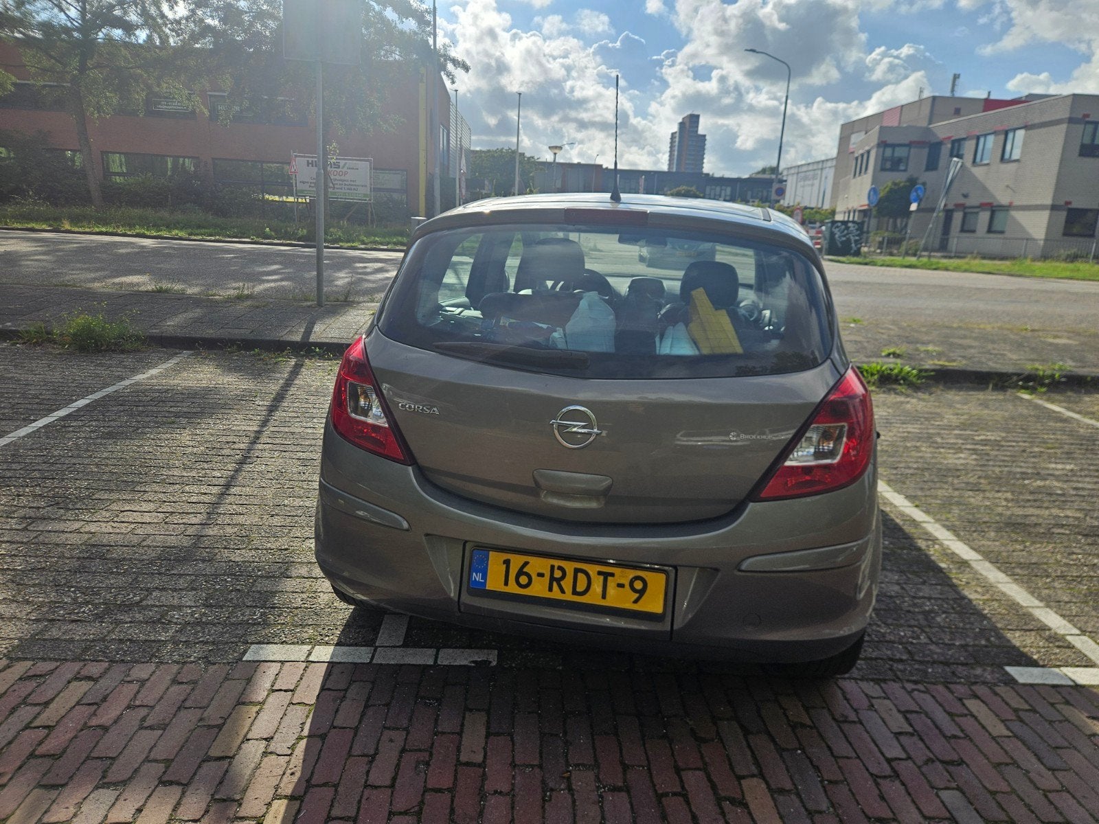 Opel Corsa 1.4 16V 5D 2011 Bruin, Auto's, Voorwielaandrijving, 1063 kg, 1398 cc, 4 cilinders