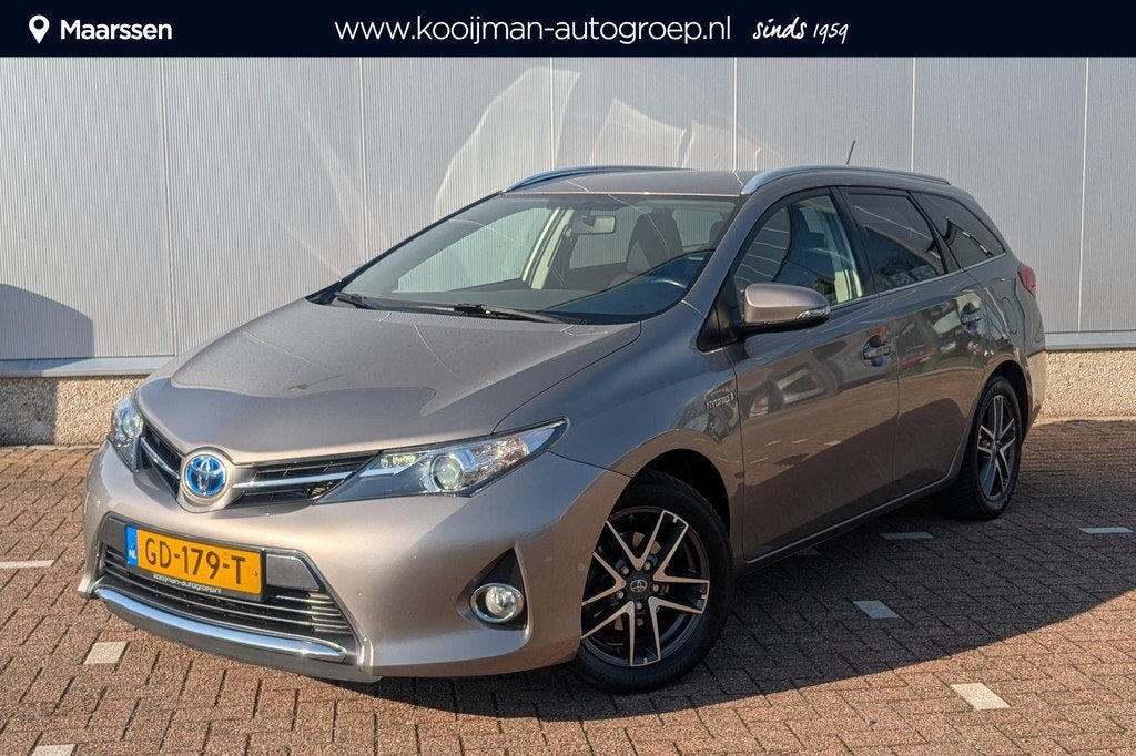 Toyota Auris Touring Sports 1.8 Hybrid Dynamic |Camera| Blue, Auto's, Toyota, Euro 5, Gebruikt, 4 cilinders, Bruin