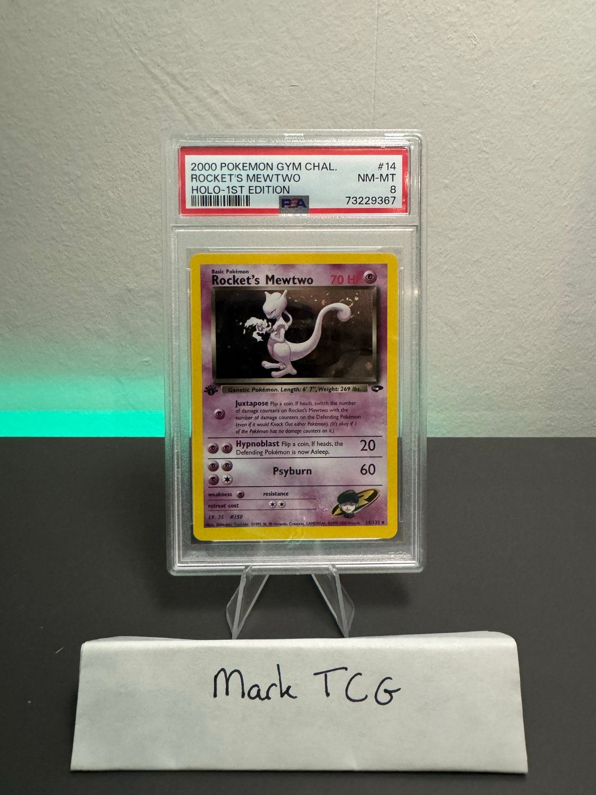 PSA 8 Rocket's Mewtwo 14/132 Holo 1st Edition Gym Challenge, Ophalen of Verzenden, Zo goed als nieuw, Losse kaart