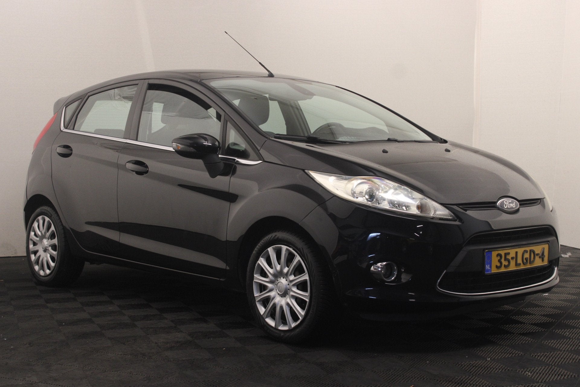 Ford Fiesta 1.25 Titanium (bj 2010), Auto's, Voorwielaandrijving, Euro 5, Stof, 82 pk