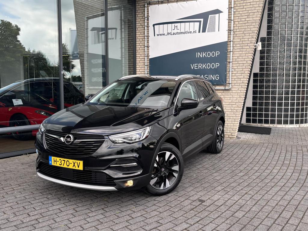 Opel Grandland X 1.2 Turbo Bus. Exec*CAMERA*AUTOM*NAVI*CRUIS, Gebruikt, 1199 cc, Leder en Stof, Zwart