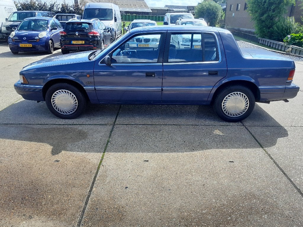 Chrysler Saratoga 3.0 I SE V6 AUT E2 1994 Blauw, Auto's, Overige modellen, Blauw, Panoramadak, Origineel Nederlands