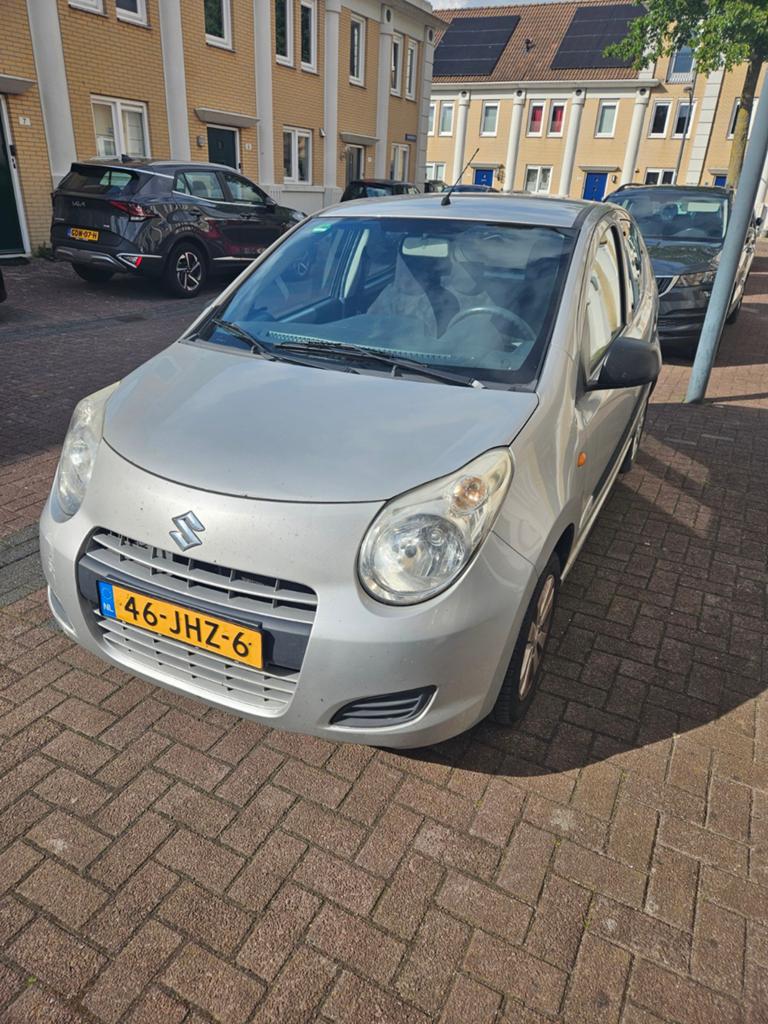 Suzuki Alto 1.0 2009 Grijs apk tot juli 2027, Auto's, Suzuki, Voorwielaandrijving, Stof, 200 kg, 4 stoelen