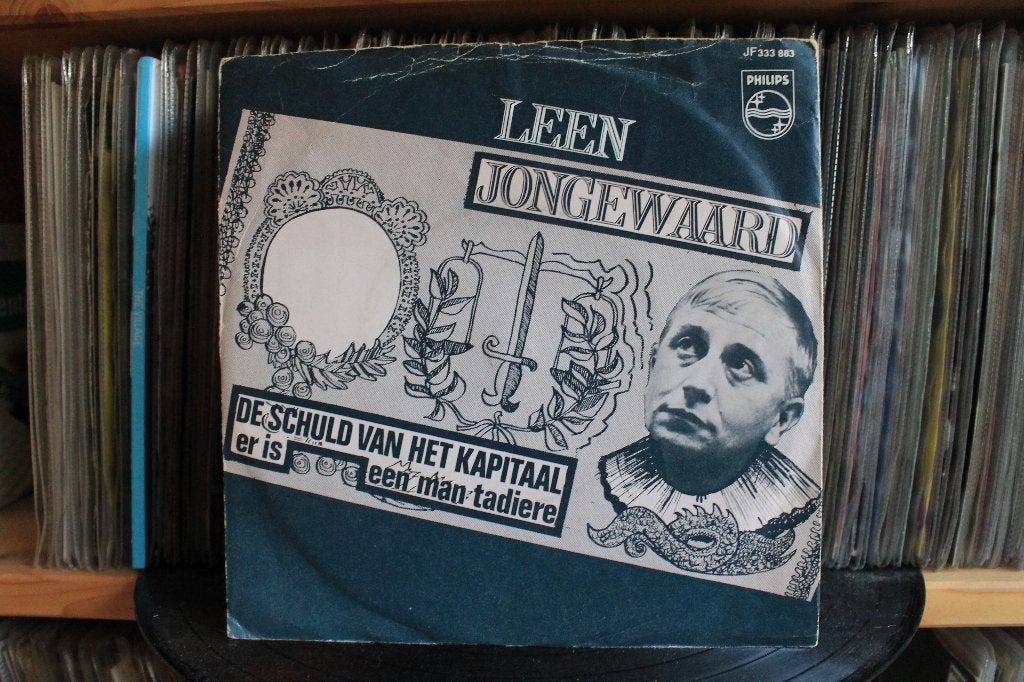 7' Single Leen Jongewaard - De Schuld Van Het Kapitaal / Er, Gebruikt, 7 inch, Ophalen of Verzenden, Overige typen