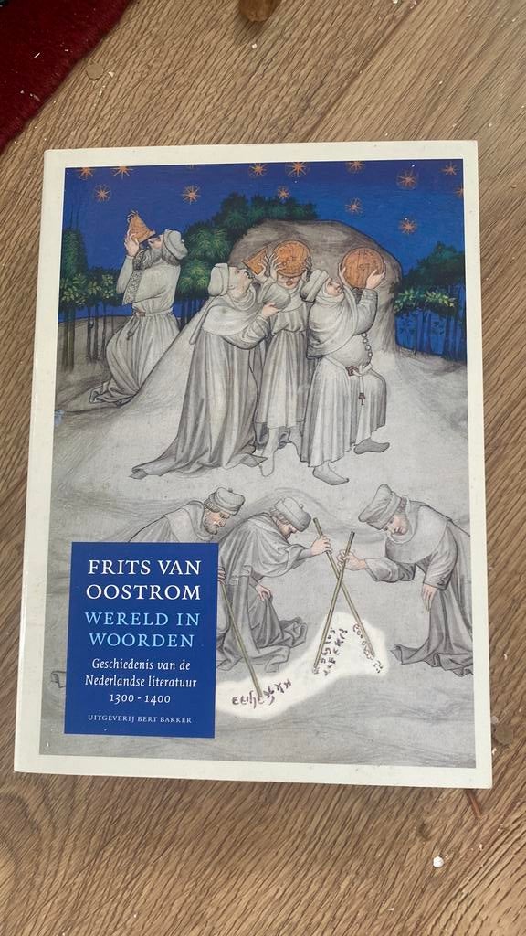 Wereld in woorden - Frits van Oostrom, Ophalen of Verzenden, Gelezen