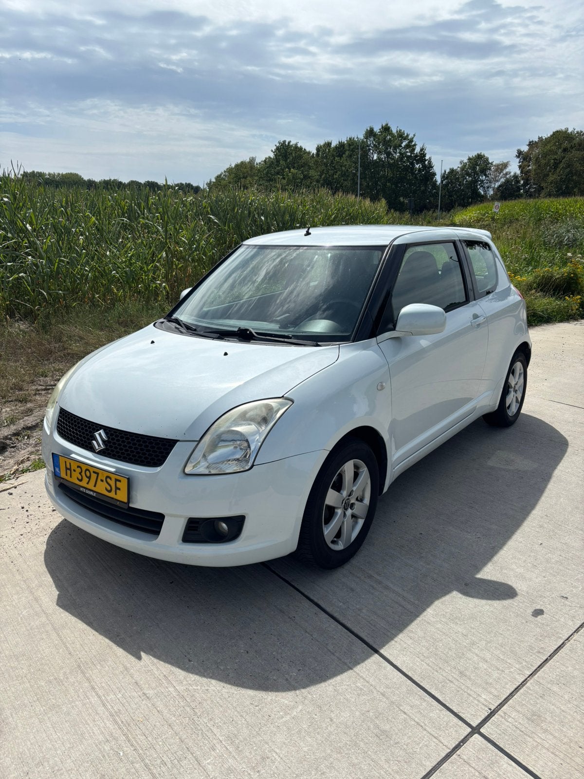 Suzuki Swift 1.3 3D 2009 Wit met Apple CarPlay, Auto's, Stof, 1000 kg, Euro 4, Geïmporteerd
