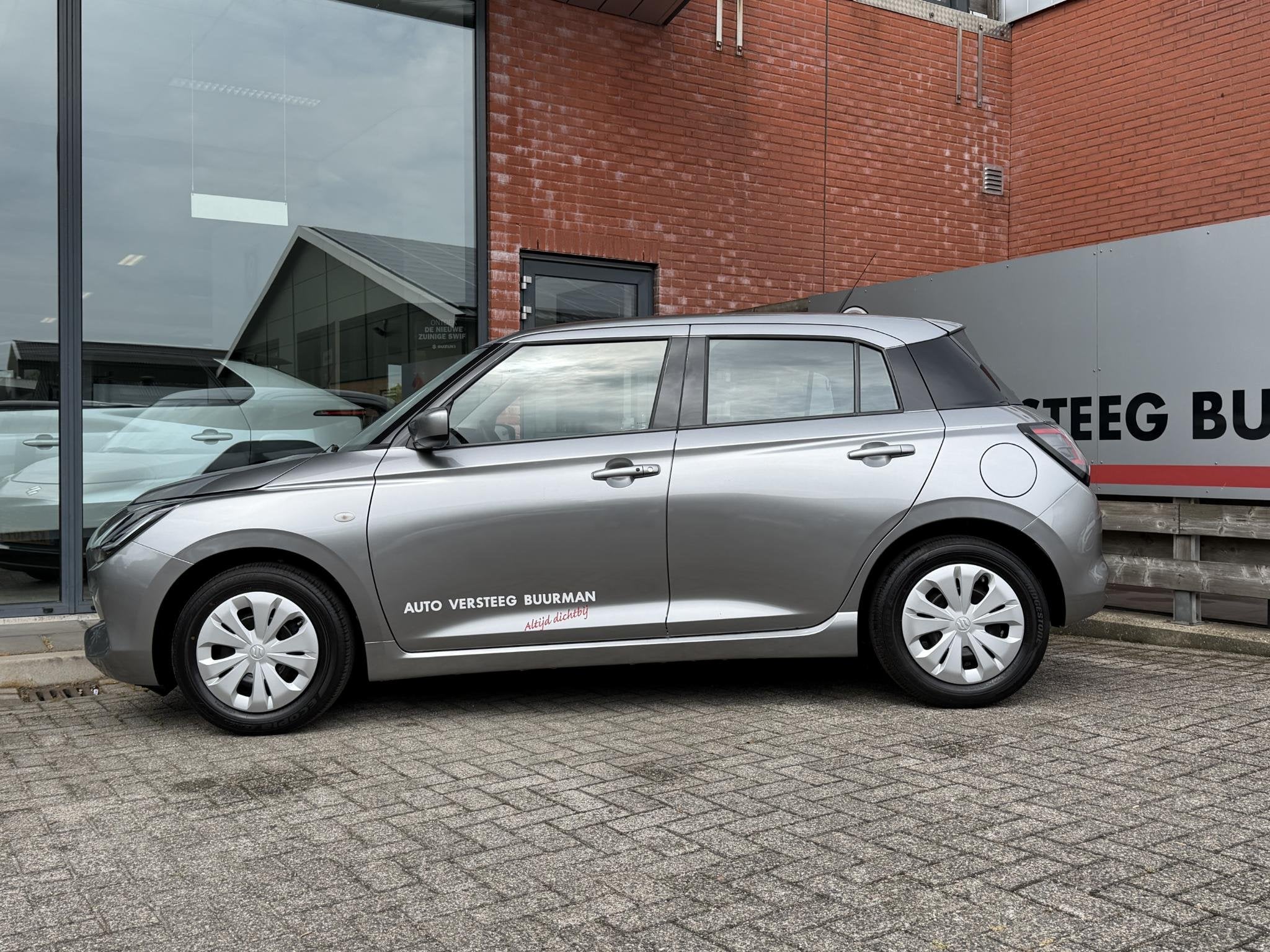 Suzuki Swift 1.2 Comfort Smart Hybrid DEMO DEAL, Achteruitri, Auto's, Suzuki, 12 maanden, Stof, Euro 6, Origineel Nederlands