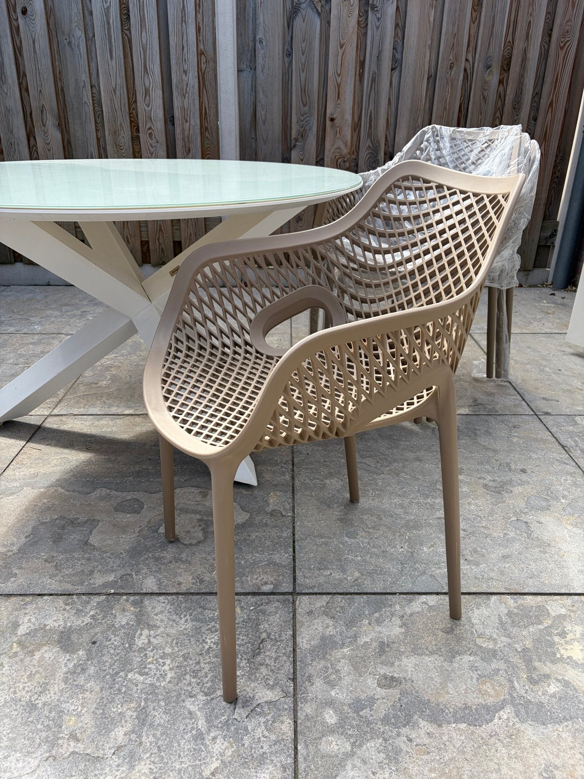 4x nieuwe Garden Impressions Air Taupe Tuinstoel, Ophalen, Nieuw, Kunststof, Stapelbaar