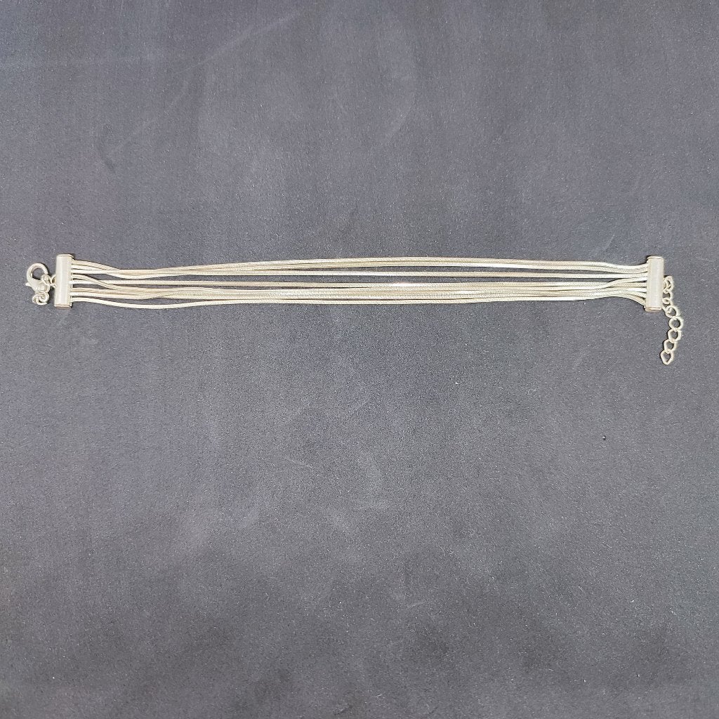 Sierlijke zilverkleurige metalen armband, Ophalen of Verzenden, Gebruikt, Zilver, Overige materialen