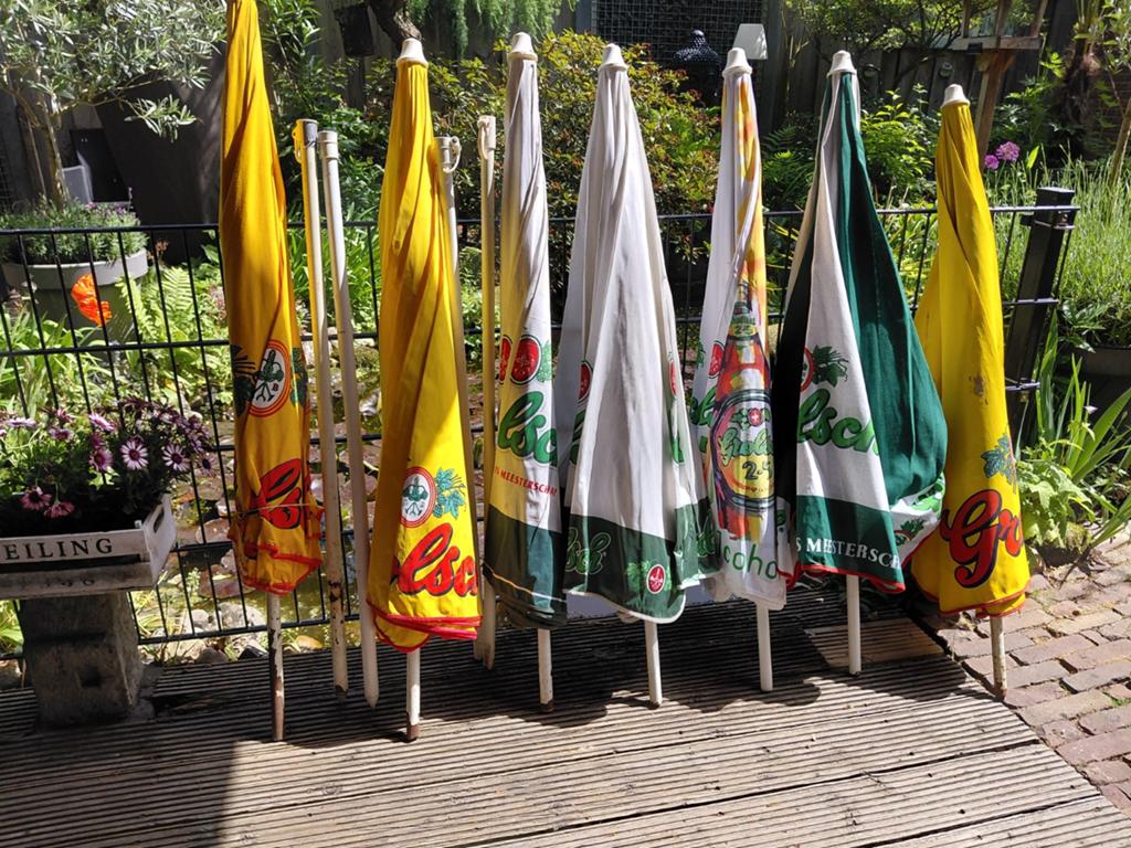 Grolsch parasols 7 stuks, Ophalen, Gebruikt, Grolsch