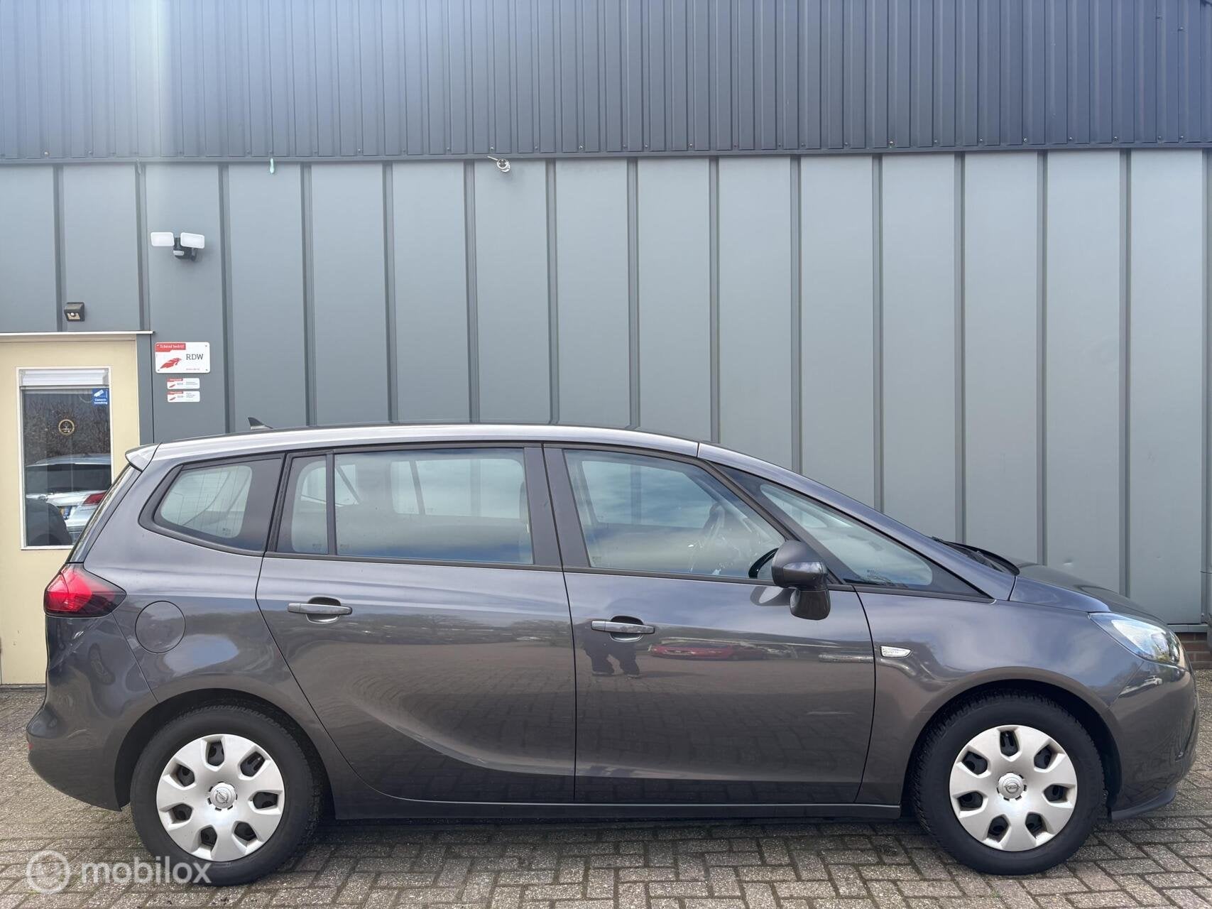 Opel Zafira Tourer 1.4 Edition Navi - Cruise - 6Bak - APK -, Auto's, Opel, Euro 5, 4 cilinders, Origineel Nederlands, Bedrijf