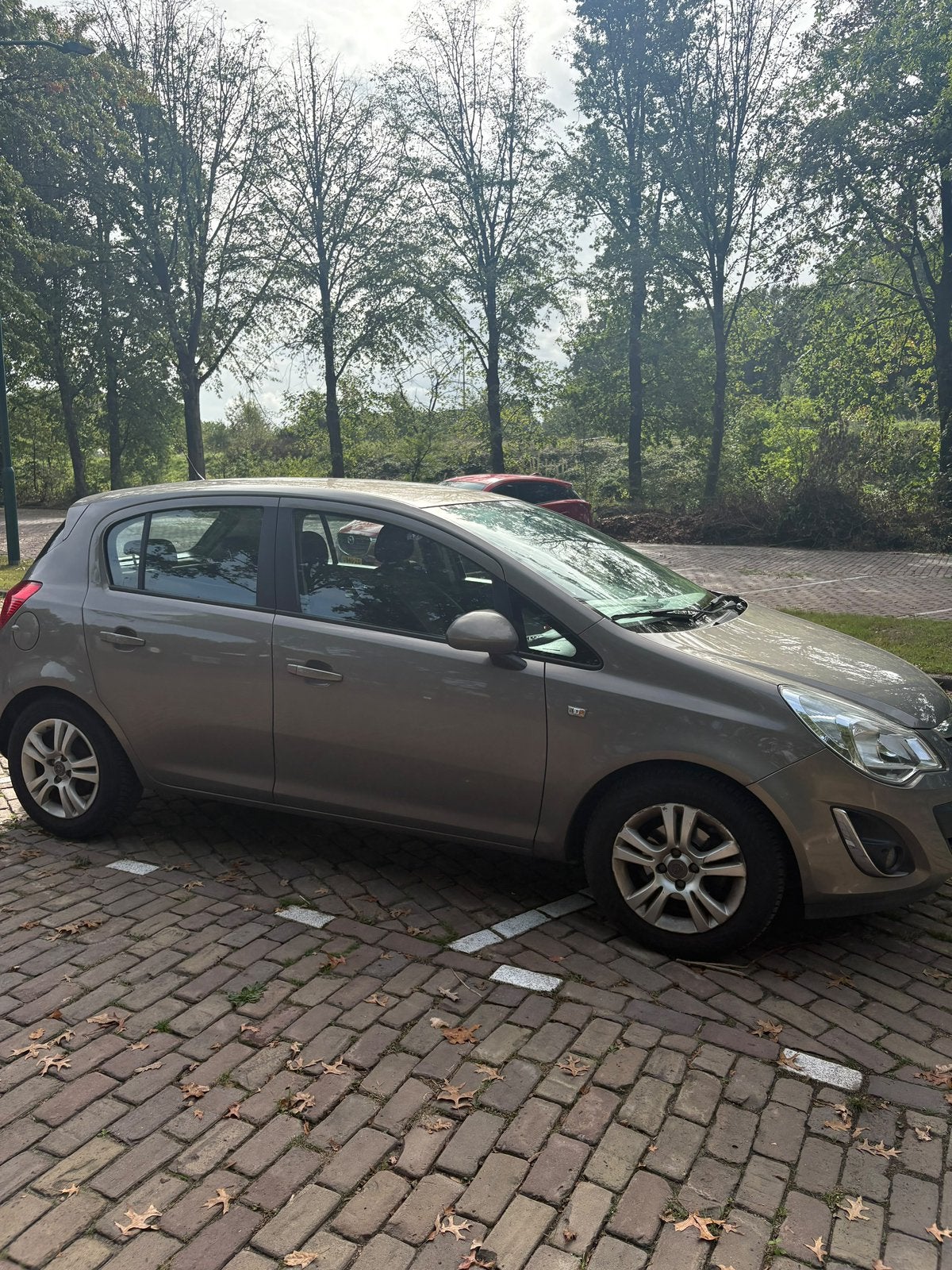 Opel Corsa 1.4 16V 5D 2013 Bruin (APK 22-09-2027), Auto's, Voorwielaandrijving, 1063 kg, 1398 cc, 4 cilinders