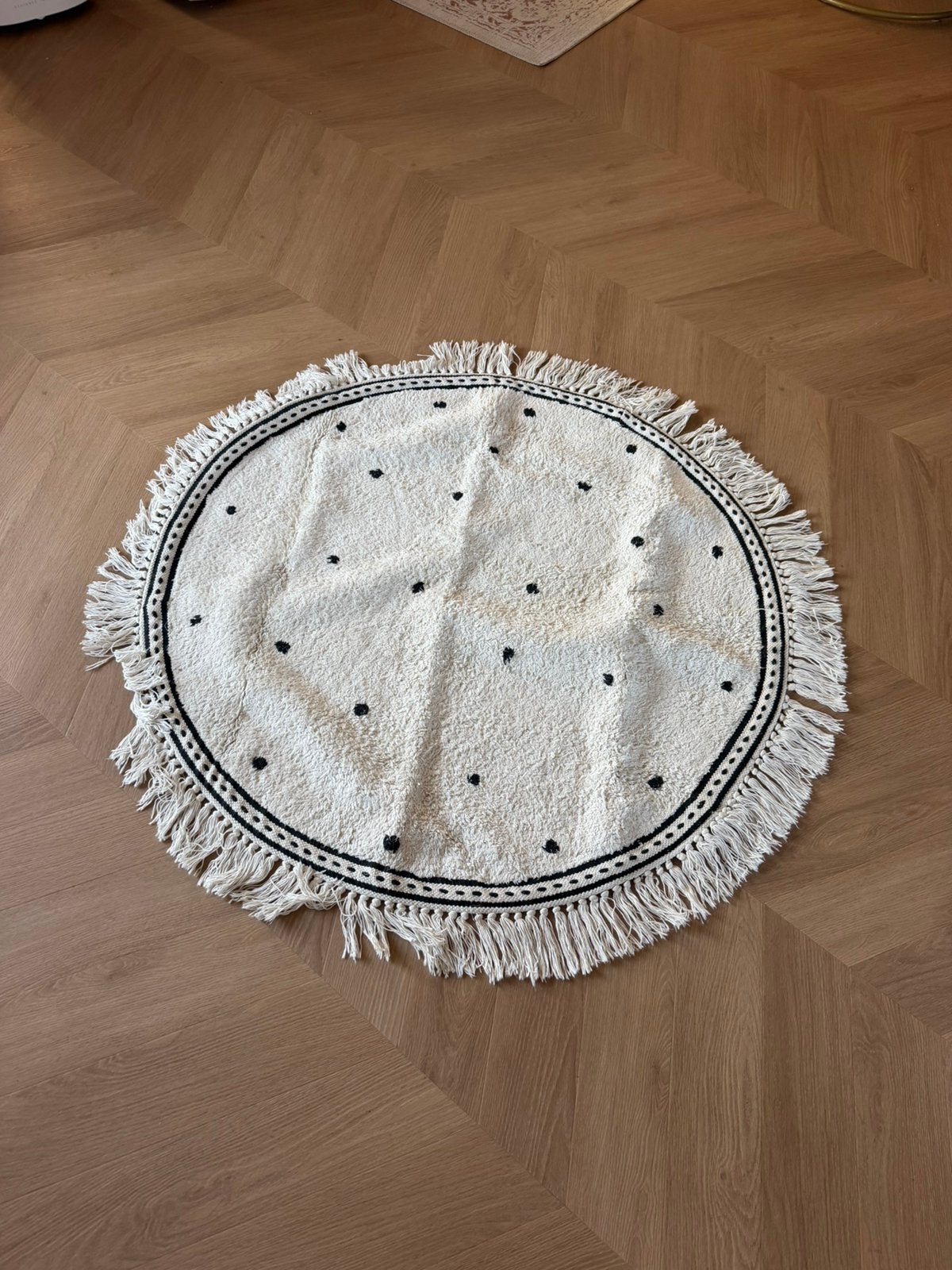 Rond tapijt Tapis Petit, Ophalen