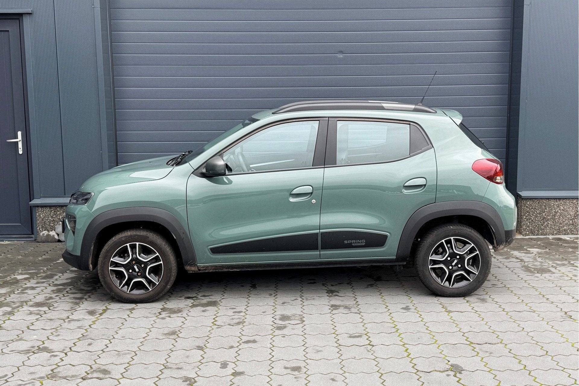 Dacia Spring Expression 27 kWh LEER CAMERA NAVI CARPLAY, Auto's, Dealer onderhouden, Gebruikt, Met garantie (alle), Parkeersensor