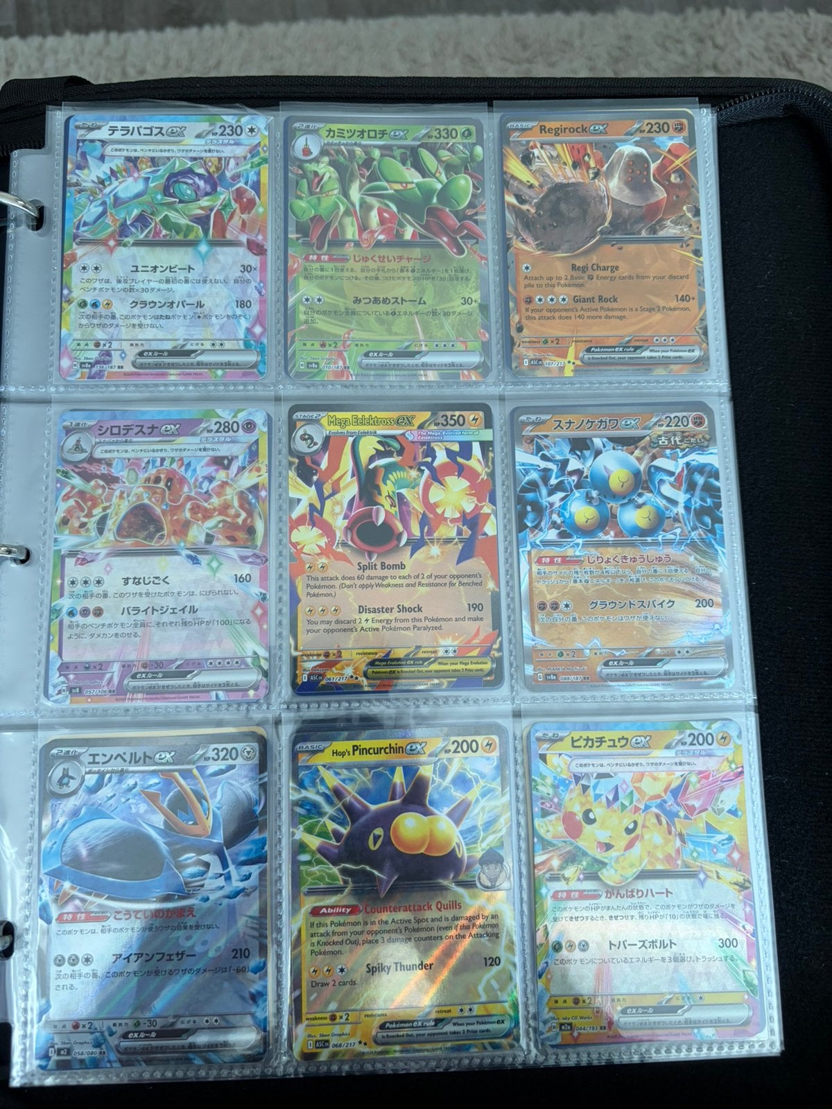 Foto 13 van Pokémon collectie: toploaders, PSA 10 Meditite, binder vol