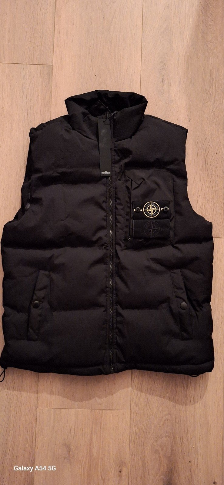 zwarte Stone Island body warmer met logo op de borst, Kleding | Heren, Maat 52/54 (L), Zwart, Nieuw, Ophalen of Verzenden