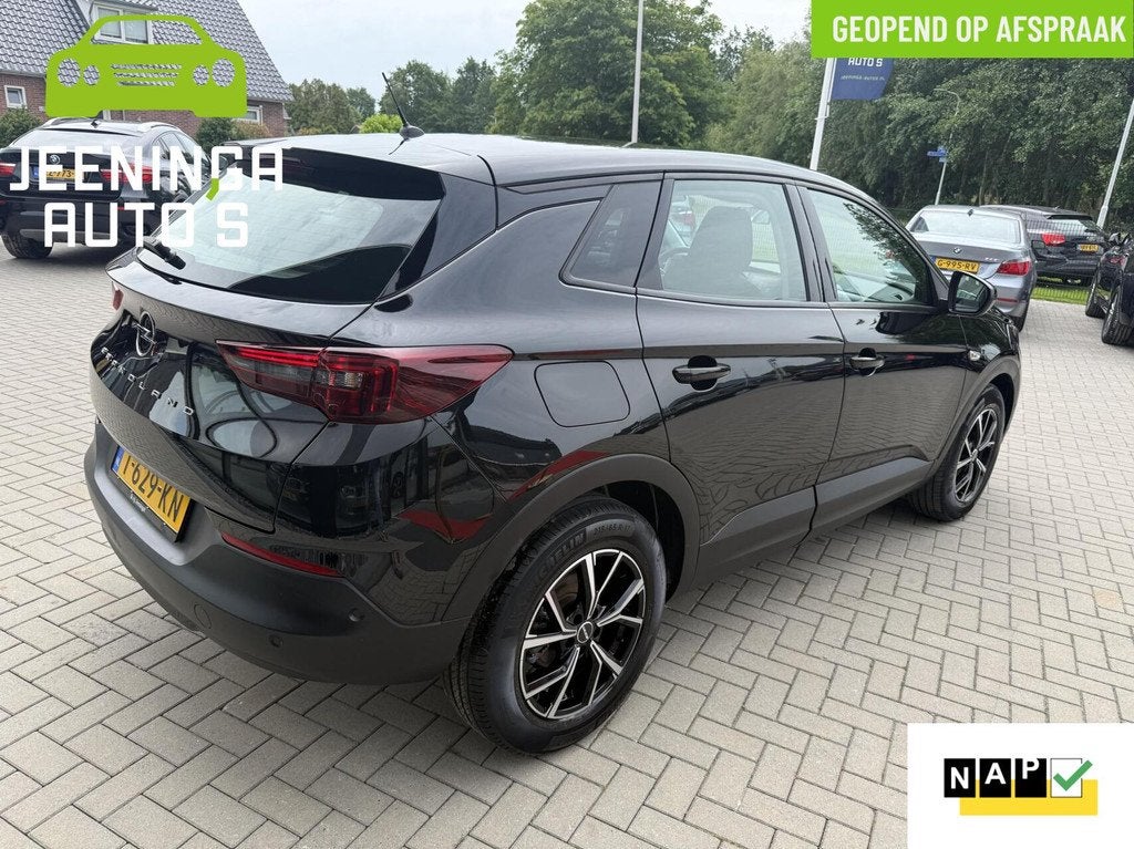 Opel Grandland 1.2 Turbo Level 2|PDC|AppleCarPlay|Clima|NAP, Auto's, Opel, Stof, Gebruikt, 1199 cc, Zwart