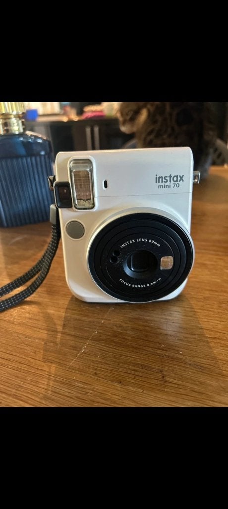 Fujifilm Instax Mini 70 - Stijlvolle Instant Camera, Instant camera, Ophalen of Verzenden, Zo goed als nieuw, Fujifilm