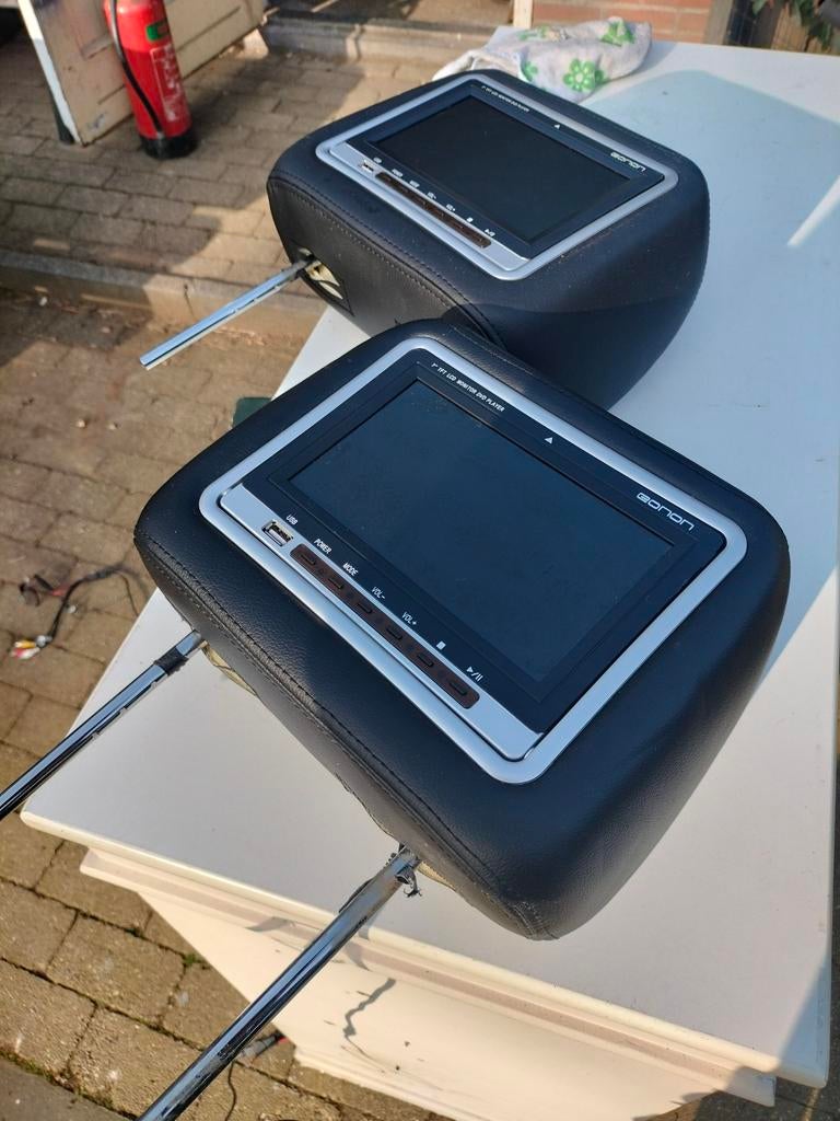 2x hoofdsteun met dvd speler, Ophalen