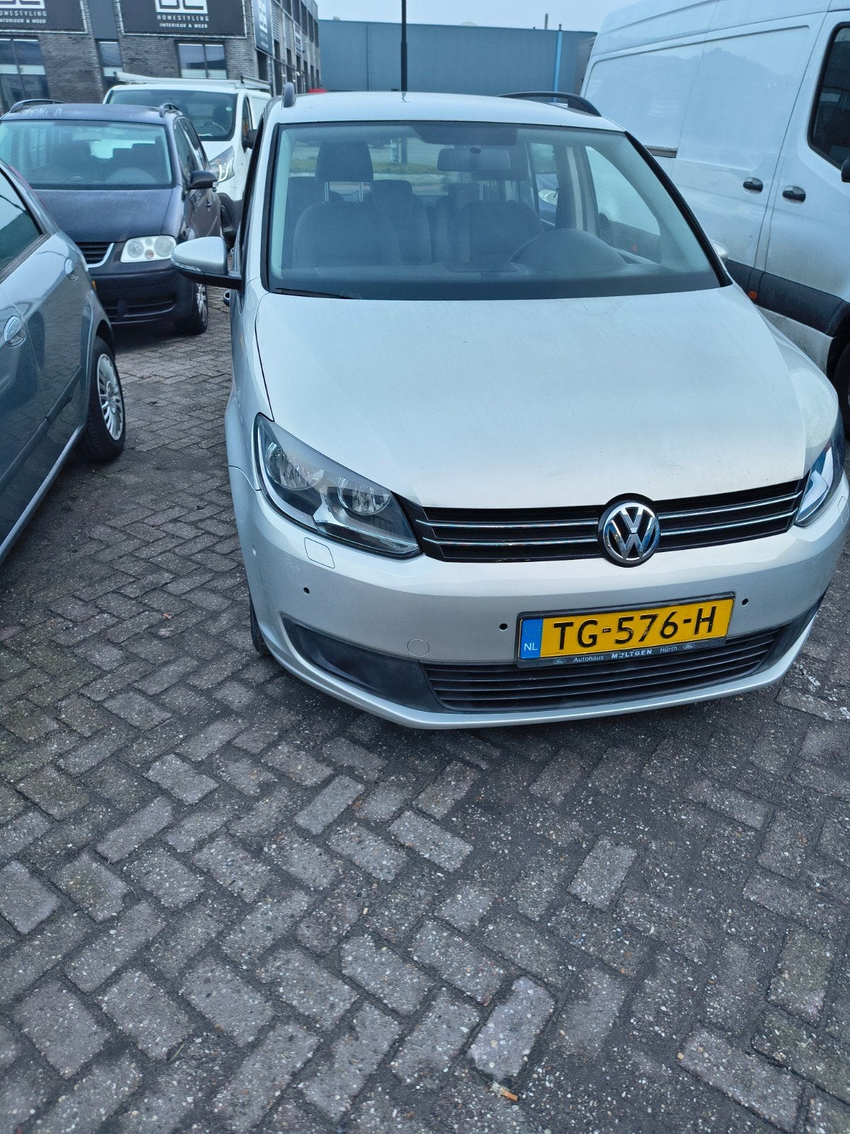 Volkswagen Touran 1.2 TSI 77KW BMT 7P 2012 Grijs, Auto's, Volkswagen, Voorwielaandrijving, Stof, 4 cilinders, 7 stoelen