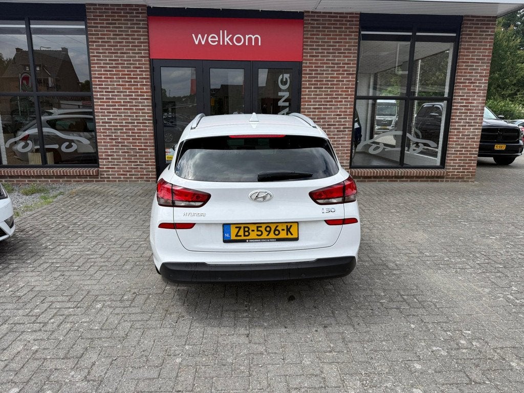 Hyundai I30 Wagon 1.4 T-GDI Premium, Auto's, Hyundai, Parkeersensor, Stof, 4 cilinders, Wit